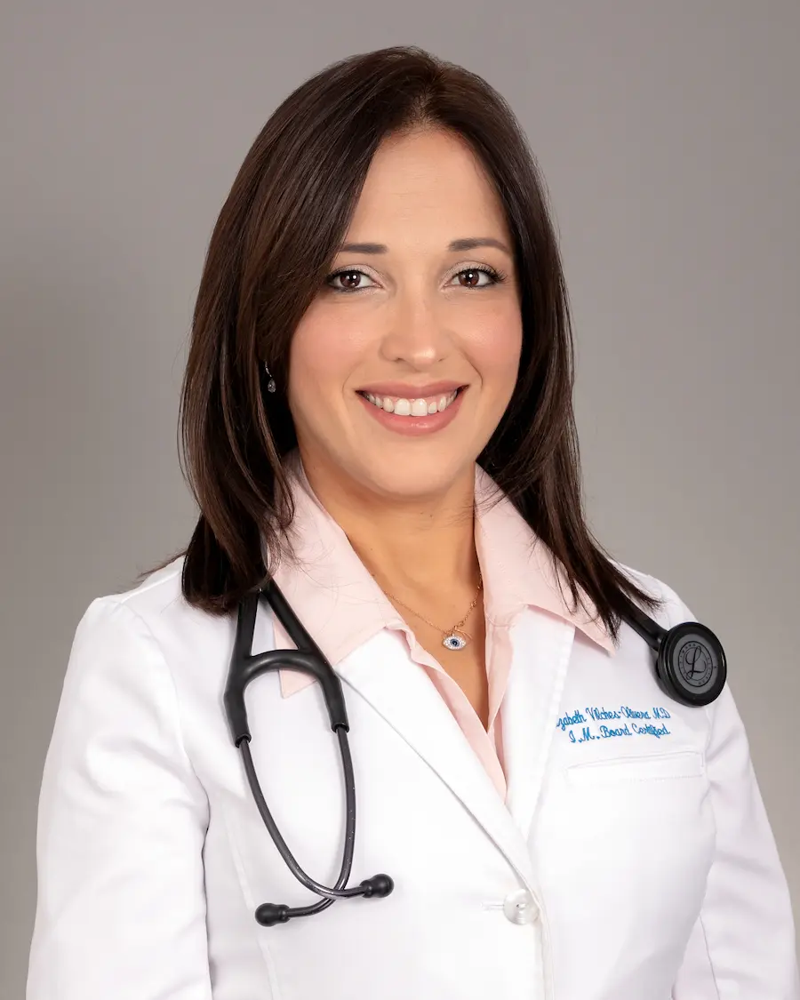 Headshot of Dr Elizabeth Vilches-Olivera smiling.